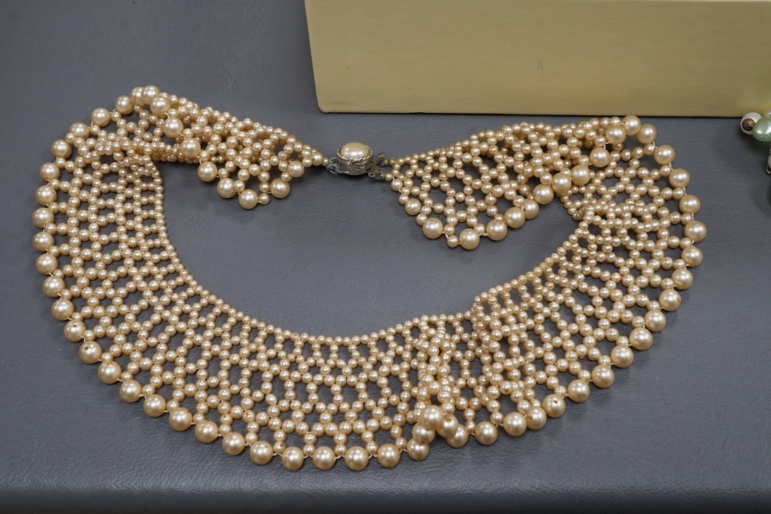 A quantity of assorted costume including necklaces, bangle, etc. and two wrist watches.